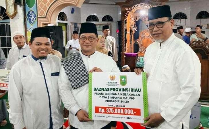 Korban Kebakaran Simpang Gaung Inhil Terima Bantuan Pemprov Riau Rp375 Juta